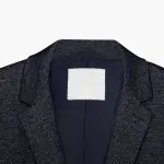 Preservare i capi d’abbigliamento nel tempo: l’importanza dell’etichetta