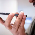 Come riprodurre news su iPhone con Siri