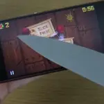 Fruit Ninja viene giocato su un Sony Xperia Z3 con un coltello